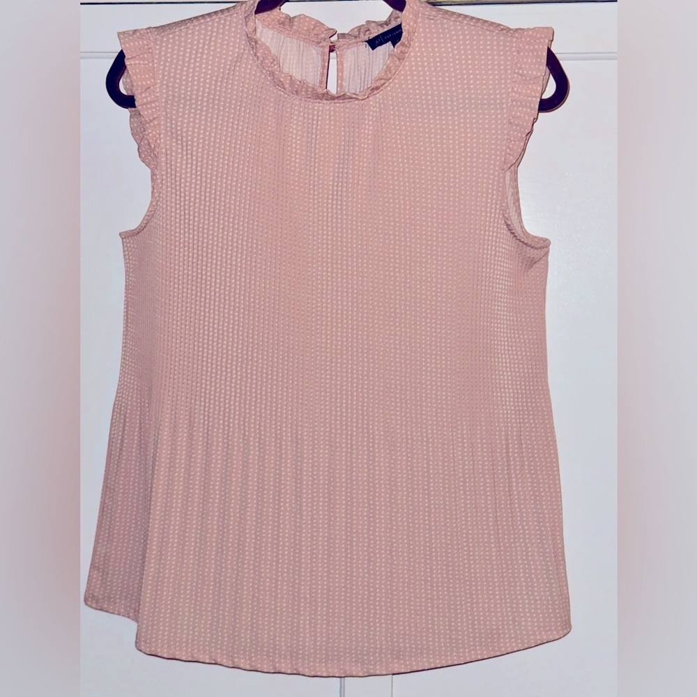 Adrianna Papell blush-pink w/modest white polka-dots. Pleating below waist
